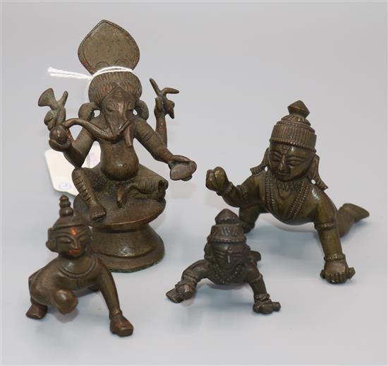 Indian bronze model of Ganesh and three small figures of the infant Krishna crawling